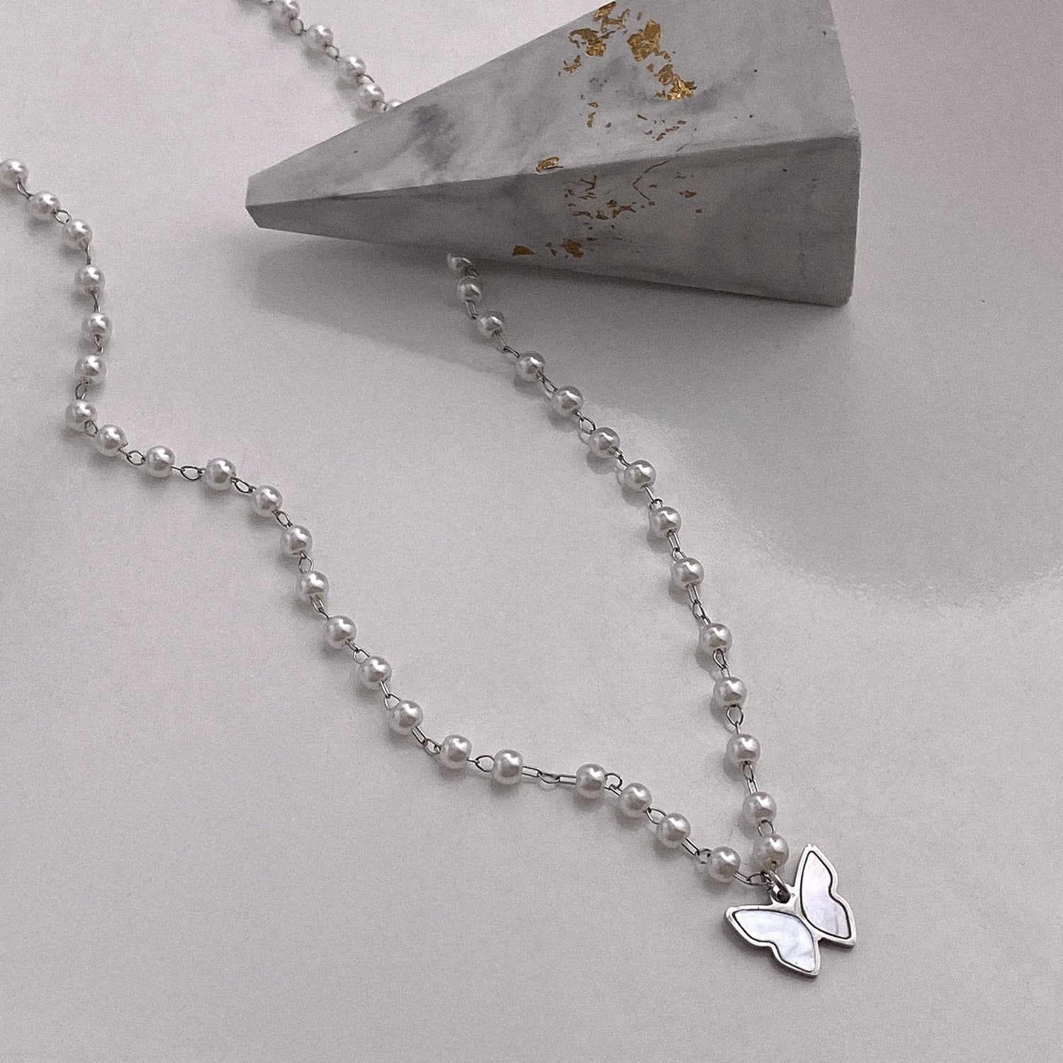 Butterfly pearl necklace